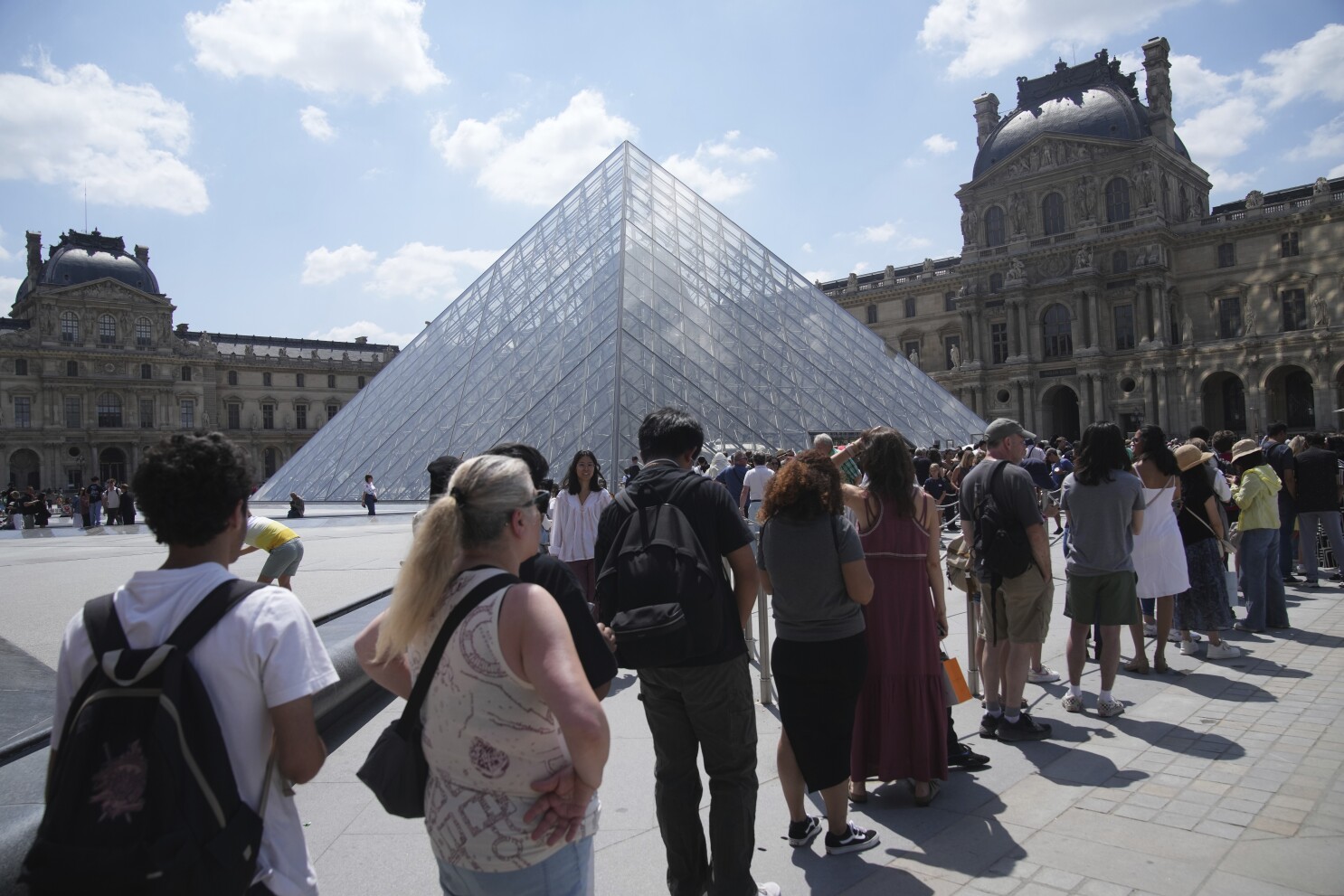 Louvre shuts down in a staff strike, sounding the alarm on overtourism