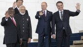 FILE - From left to right, South Africa's President Cyril Ramaphosa, China's President Xi Jinping, India's Prime Minister Narendra Modi, Russia's President Vladimir Putin and Brazil's President Jair Bolsonaro pose for a photo at the BRICS emerging economies at the Itamaraty palace in Brasilia, Brazil, Thursday, Nov. 14, 2019. Russia and China will look to gain more political and economic ground in the developing world at a summit of the BRICS bloc in South Africa this week. Putin will take part in the main summit on Wednesday, Aug. 23, 2023 via video link after an International Criminal Court arrest warrant complicated his travel to South Africa. (AP Photo/Pavel Golovkin, Pool, File)
