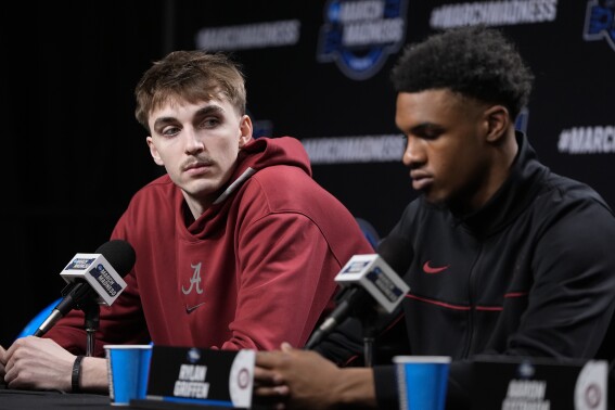 Alabama forward Grant Nelson, left, and guard Rylan Griffen field questions during a news conference Friday, March 29, 2024, in Los Angeles. Alabama plays against Clemson on Saturday in an Elite Eight college basketball game in men's NCAA Tournament. (AP Photo/Ryan Sun)