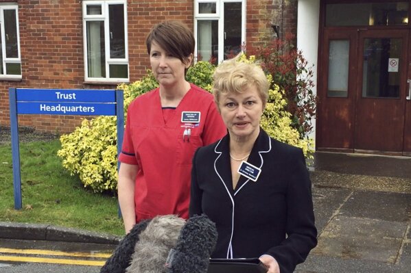 
              Dr Christine Blanshard, Medical Director, and Lorna Wilkinson, director of nursing, left, make a statement outside the District Hospital in Salisbury, England, Tuesday April 10, 2018, giving an update on the condition of nerve agent poison victims Yulia and Sergei Skripal.  Yulia Skripal has been discharged from hospital Tuesday, "This is not the end of her treatment but marks a significant milestone," said Dr. Christine Blanshard, and her Russian father former double agent Sergei Skripal remains in hospital. (Ben Mitchell/PA via AP)
            