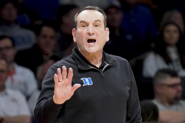 Duke head coach Mike Krzyzewski works the bench in the first half of an NCAA college basketball game against Syracuse during quarterfinals of the Atlantic Coast Conference men's tournament, Thursday, March 10, 2022, in New York. (AP Photo/John Minchillo)