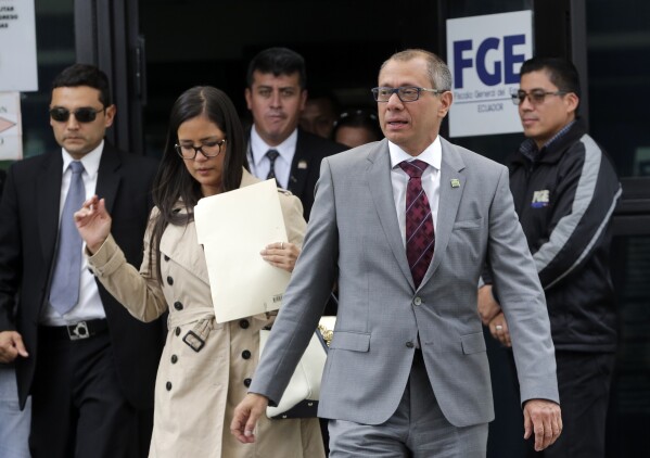 FILE - Ecuador's Vice President Jorge Glas leaves the General Attorney's Office after making a voluntary statement regarding his alleged connection with two corruption cases in Quito, Ecuador, Aug. 9, 2017. Ecuadorian police broke through the external doors of the Mexican Embassy in Quito, Friday, April 6, 2024, to arrest Glas, who had been residing there since December. (AP Photo/Dolores Ochoa, File)