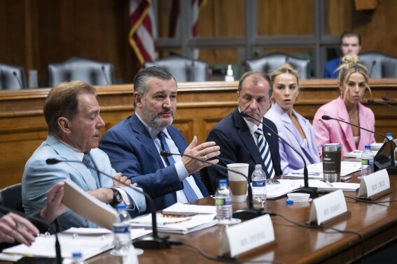 Former University of Alabama Head Football Coach Nick Saban, from left, Sen. Ted Cruz, R-Texas, Commissioner of the Atlantic Coast Conference (ACC) Jim Phillips, former University of Miami student-athlete Hanna Cavinder and TCU student-athlete Haley Cavinder participate in a roundtable on the future of college athletics and the need to codify name, image and likeness rights for student athletes, on Capitol Hill, Tuesday, March 12, 2024, in Washington. (AP Photo/Manuel Balce Ceneta)