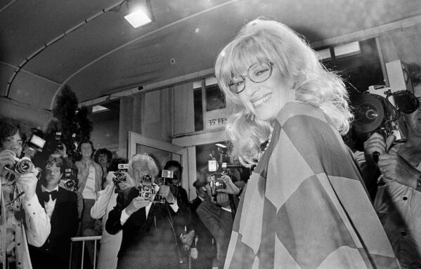 FILE - Italian actress Monica Vitti arrives at the Festival Palace to see director Michelangelo Antonioni's film "Identificazione di una Donna" (Identification of a Woman), the Italian entry at the 35 annual Cannes Film Festival in Cannes, France, May 23, 1982. Monica Vitti, the versatile blond star of Michelangelo Antonioni's "L'Avventura" and other Italian alienation films of the 1960s, and later a leading comic actress, has died. She was 90. (AP Photo/Jean Jacques Levy, File)
