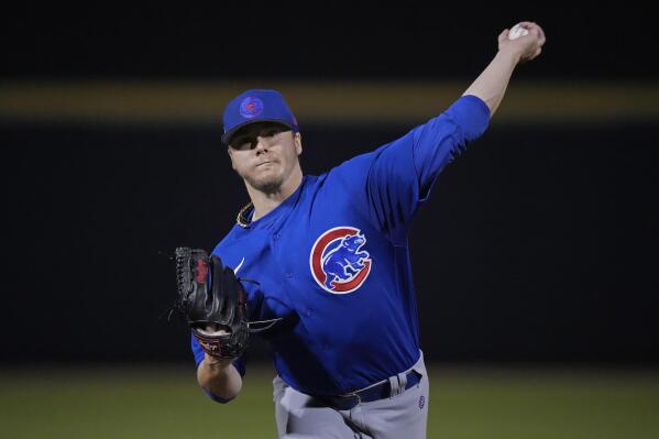 Chicago Cubs starting pitcher Justin Steele throws during the second inning of a spring training baseball game against the San Diego Padres Friday, March 3, 2023, in Peoria, Ariz. (AP Photo/Charlie Riedel)