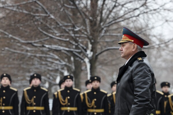 Russian Defense Minister Sergei Shoigu arrives to take part in a wreath laying ceremony at the Tomb of the Unknown Soldier in Alexander Garden on Defender of the Fatherland Day, in Moscow, Russia, Friday, Feb. 23, 2024. (Alexander Kazakov, Sputnik, Kremlin Pool Photo via AP)