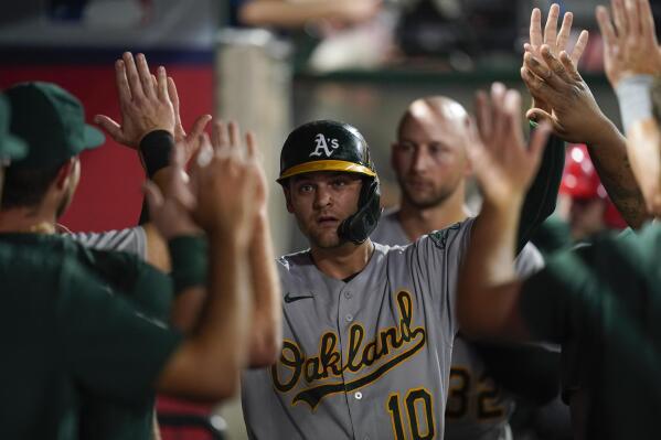 A's come alive in 5-run 8th to beat Angels 7-3