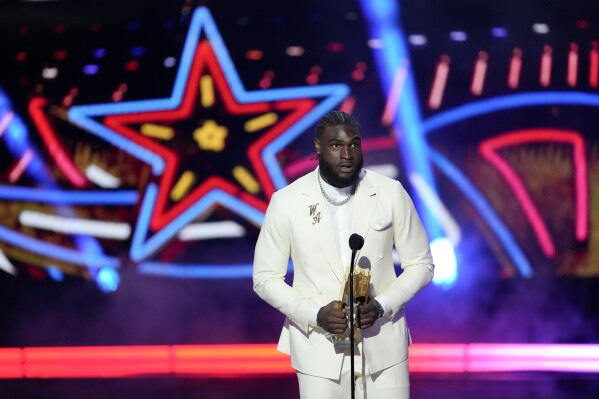 Houston Texans' Will Anderson, AP defensive rookie of the year speaks during the NFL Honors award show ahead of the Super Bowl 58 football game Thursday, Feb. 8, 2024, in Las Vegas. (AP Photo/David J. Phillip)