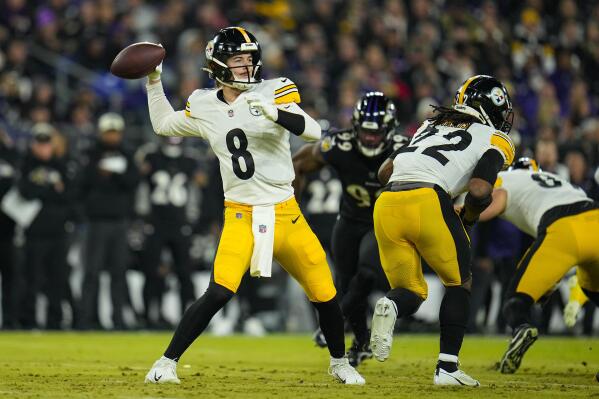Pittsburgh Steelers quarterback Kenny Pickett (8) throws against the Baltimore Ravens in the first half of an NFL football game in Baltimore, Sunday, Jan. 1, 2023. (AP Photo/Julio Cortez)