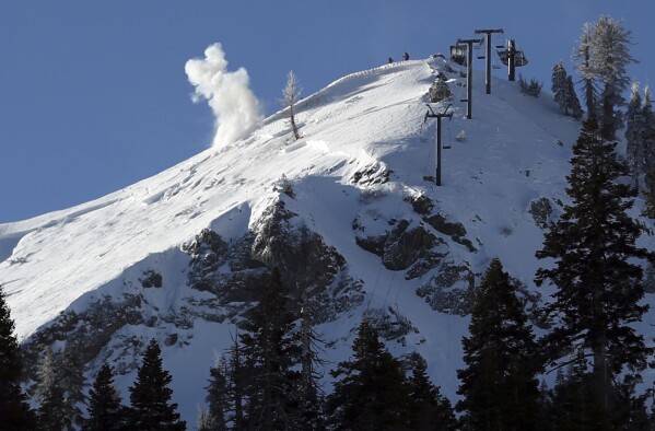 FILE -A charge is detonated to remove avalanche risk near the scene of Wednesday's deadly slide at Palisades Tahoe Ski resort in Olympic Valley, Calif., on Thursday, Jan. 11, 2024. As a massive winter storm dumped snow across much of the western U.S., winter sport enthusiasts headed to ski resorts and backcountry slopes ahead of the long Martin Luther King Jr. Day weekend. But in many areas, the storm brought a high risk of avalanche conditions.(Scott Strazzante/San Francisco Chronicle via AP, File)