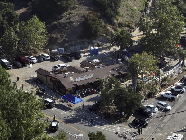 This aerial photo shows Cook's Corner, the scene of a mass shooting, Thursday, Aug. 24, 2023, in Trabuco Canyon, Calif. (AP Photo/Jae C. Hong)