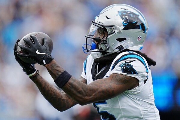 WR Diontae Johnson not worrying about trade rumors, would prefer to stay  with the Panthers | AP News