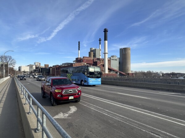Vehicles drives on the Burlington Street Bridge in Iowa City, Iowa Wednesday, on March 6, 2024. (AP Photo/Ryan J. Foley