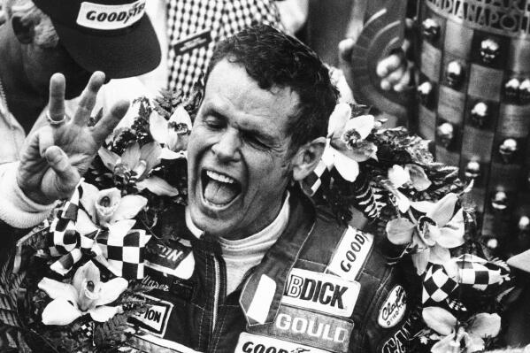 FILE - In this May 24, 1981, file photo, Bobby Unser holds three fingers aloft after winning his third Indianapolis 500 auto race ,in Indianapolis, Ind. Three-time Indianapolis 500 winner Bobby Unser has died. He died of natural causes at his home in Albuquerque, New Mexico, on Sunday, May 2, 2021. He was 87. (AP Photo/File)