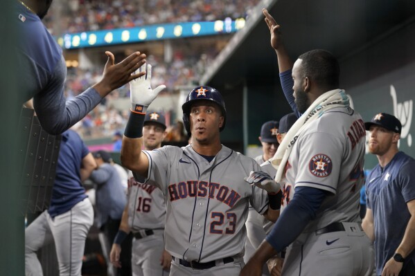 Photos: Astros take first of four vs. Rangers in mammoth AL West