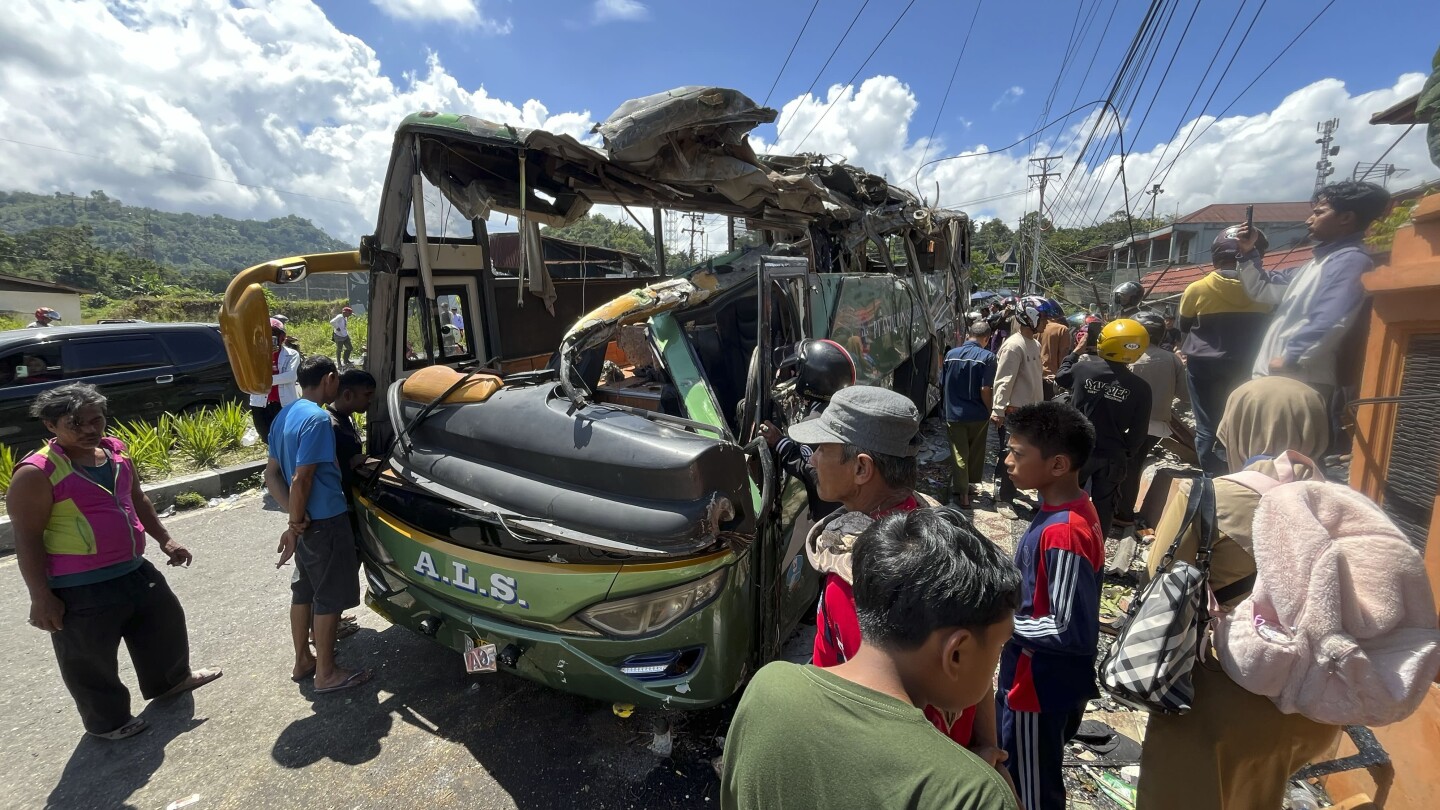 At least 12 dead in Indonesia bus crash after brakes apparently failed, police say