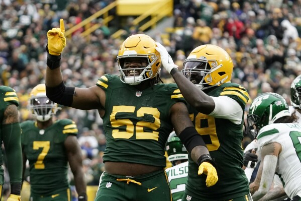 FILE - Green Bay Packers linebacker Rashan Gary (52) reacts after a sack of New York Jets quarterback Zach Wilson during the first half of an NFL football game Sunday, Oct. 16, 2022, in Green Bay, Wis. Packers outside linebacker Rashan Gary took a step forward in his return from a torn anterior cruciate ligament by getting activated from the physically unable to perform list. Packers coach Matt LaFleur said before Monday’s Aug. 7, 2023, practice that Gary is getting activated. (AP Photo/Morry Gash, File)