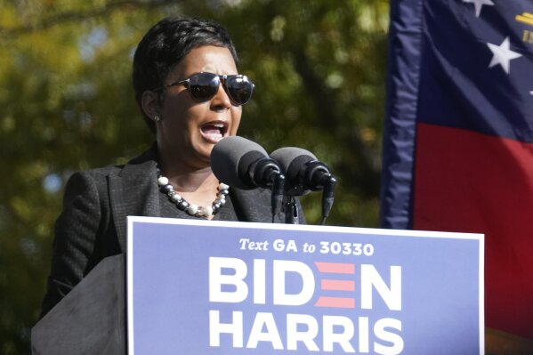 Atlanta Mayor Keisha Lance Bottoms speaks to Biden supporters as they wait for former President Barack Obama to arrive and speak at a rally as he campaigns for Democratic presidential candidate former Vice President Joe Biden, Monday, Nov. 2, 2020, at Turner Field in Atlanta. (AP Photo/Brynn Anderson)