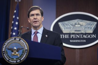 Defense Secretary Mark Esper speaks during a joint news conference with Japan's Defense Minister Taro Kono at the Pentagon in Washington, Tuesday, Jan. 14, 2020. (AP Photo/Manuel Balce Ceneta)