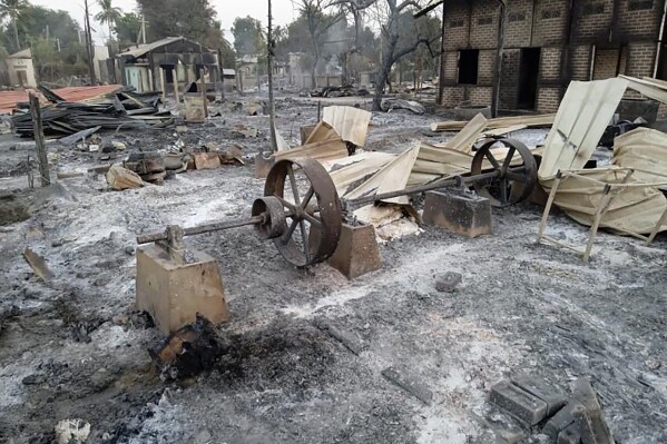 FILE - Charred homes sit in piles of ash in Mwe Tone village of Pale township, in the Sagaing region, Myanmar, on Feb. 1, 2022. Myanmar’s military and affiliated militias are committing increasingly frequent and brazen war crimes, including aerial bombings targeting civilians, a group of investigators established by the United Nations said Tuesday Aug. 8, 2023. (AP Photo, File)