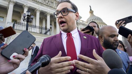 FILE - Rep. George Santos, R-N.Y., speaks to reporters outside after an effort to expel him from the House, at the Capitol in Washington, Wednesday, May 17, 2023. Santos wants to protect family members by asking that the courts keep his bond cosigners secret as he fights criminal charges, his lawyer told a Long Island federal judge Friday, June 9, as he asked her to reverse a magistrate judge's decision to make the names public. (AP Photo/J. Scott Applewhite, File)