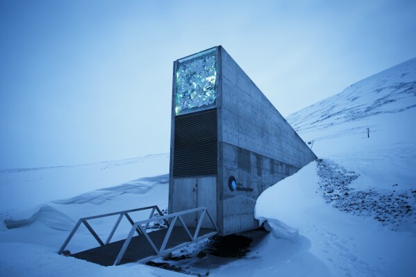 FILE - Exterior view of the Svalbard Global Seed Vault, the secure seed bank on Svalbard, Norway, March 2, 2016. Two men who were instrumental in the “craziest idea anyone ever had” of creating a global seed vault designed to safeguard the world's agricultural diversity will be honored as the 2024 World Food Prize laureates, officials announced Thursday, May 9, 2024, in Washington. (Heiko Junge/ NTB scanpix via AP, File)