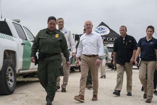 U.S. Homeland Security Secretary Alejandro Mayorkas arrives for a press conference in Brownsville, Texas, Friday, May 5, 2023. Mayorkas said Friday that authorities faced “extremely challenging” circumstances along the border with Mexico days before pandemic-related asylum restrictions end. (AP Photo/Veronica G. Cardenas)