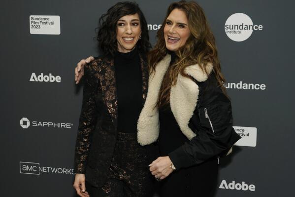 Brooke Shields, right, the subject of the documentary film "Pretty Baby: Brooke Shields," poses with director Lana Wilson at the premiere of the film at the 2023 Sundance Film Festival, Friday, Jan. 20, 2023, in Park City, Utah. (AP Photo/Chris Pizzello)