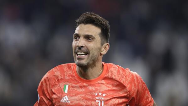 FILE -- In this Oct.19, 2019 file photo Juventus' goalkeeper Gianluigi Buffon celebrates at the end of a Serie A soccer match between Juventus and Bologna, at the Allianz stadium in Turin, Italy.  Buffon rejoined Serie B club Parma on Thursday, June 17, 2021, more than a quarter century after beginning his legendary Serie A career with the club. (AP Photo/Luca Bruno)