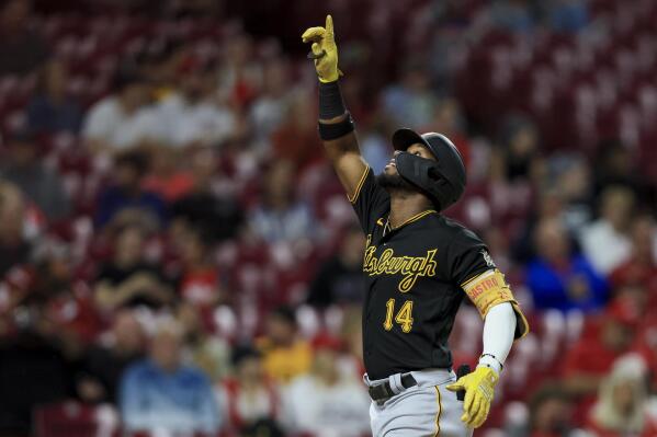 Pittsburgh Pirates' Rodolfo Castro points to the sky as he celebrates hitting a three-run home run during the fifth inning of a baseball game against the Cincinnati Reds in Cincinnati, Monday, Sept. 12, 2022. (AP Photo/Aaron Doster)