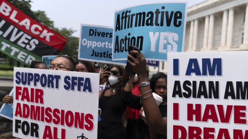 FILE - Demonstrators protest outside of the Supreme Court in Washington, Thursday, June 29, 2023, after the Supreme Court struck down affirmative action in college admissions, saying race cannot be a factor. Days after the Supreme Court outlawed affirmative action in college admissions, activists say they will sue Harvard over its use of legacy preferences for children of alumni. (AP Photo/Jose Luis Magana, File)