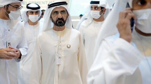 FILE - Sheikh Mohammed bin Rashid Al Maktoum, UAE prime minister and ruler of Dubai, center, attends World Government Summit at the Dubai Expo 2020, in Dubai, United Arab Emirates, Tuesday, March 29, 2022. The United Arab Emirates plans to triple its supply of renewable energy and invest up to $54 billion over the next seven years to meet its growing energy demands. Sheikh Mohammed bin Rashid Al Maktoum, the UAE's vice president and ruler of Dubai, announced the plans on Monday, July 3, 2023, following a Cabinet meeting. (AP Photo/Ebrahim Noroozi, File)