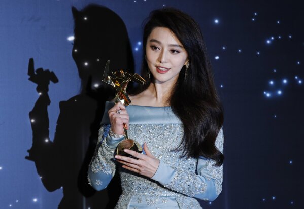 
              FILE - In this March 21, 2017, file photo, Chinese actress Fan Bingbing poses after winning the Best Actress Award of the Asian Film Awards in Hong Kong. Fan Bingbing, one of China's best-known starlets and a rising Hollywood star, has well and truly fallen off the map amid vague allegations of tax shenanigans and possibly other infractions that have put her at odds with China's Communist Party-appointed culture czars. (AP Photo/Kin Cheung, File)
            