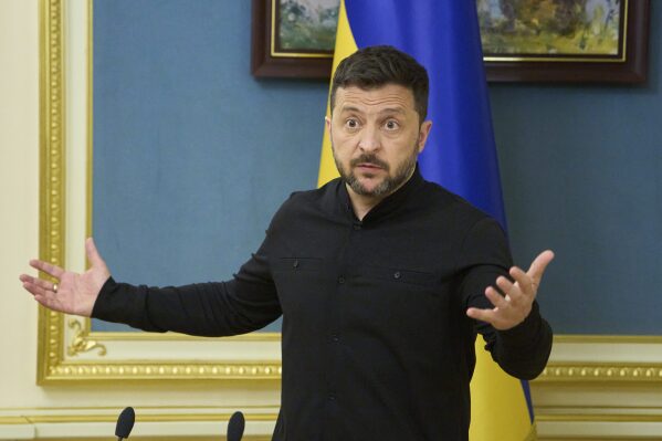 Ukrainian President Volodymyr Zelenskyy speaks during a briefing in Kyiv, Ukraine, Monday, May 19, 2025. (AP Photo/Efrem Lukatsky)