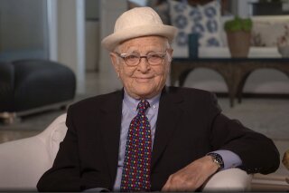 In this video grab issued Sunday, Feb. 28, 2021, by NBC, Norman Lear accepts the Carol Burnett television achievement award at the Golden Globe Awards. (NBC via AP)