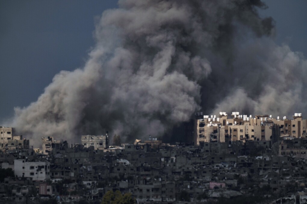 Smoke rises to the sky following an explosion in the Gaza Strip, as seen from southern Israel, Friday, March 8, 2024. (AP Photo/Leo Correa)