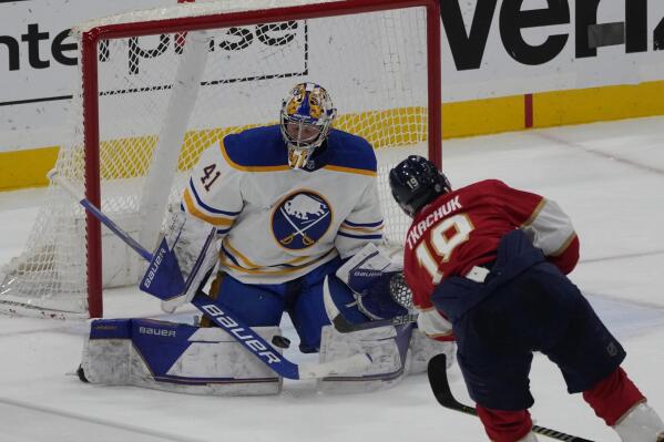 Buffalo Sabres goaltender Craig Anderson (41) stops a shot on goal by Florida Panthers left wing Matthew Tkachuk (19)during the third period of an NHL hockey game, Friday, Feb. 24, 2023, in Sunrise, Fla. (AP Photo/Marta Lavandier)