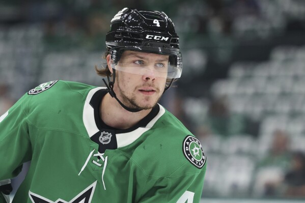 Dallas Stars defenseman Miro Heiskanen warms up before Game 4 of a second-round NHL hockey playoff series against the Winnipeg Jets in Dallas, Tuesday, May 13, 2025. (AP Photo/Gareth Patterson)