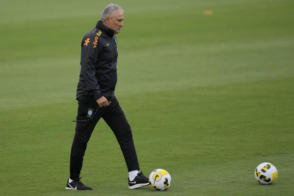 Brazil's coach Tite attends a training session at the Granja Comary training center in Teresopolis, Brazil, Wednesday, March 23, 2022. Brazil will face Chile in a qualifying soccer match for the FIFA World Cup Qatar 2022 in Rio de Janeiro on Thursday. (AP Photo/Silvia Izquierdo)