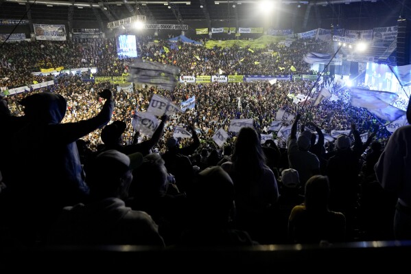 Union workers attend a rally of the General Labor Confederation, with Argentine Economy Minister and ruling party presidential primary candidate Sergio Massa, in Buenos Aires, Argentina, Tuesday, Aug. 8, 2023. Primary elections set for all political parties in Argentina on Aug. 13. (AP Photo/Natacha Pisarenko)