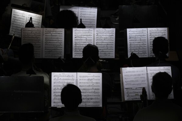 Musicians of the "Teatro dell' Opera" opera house orchestra practice in Rome, Thursday, April 10, 2025. (AP Photo/Andrew Medichini)