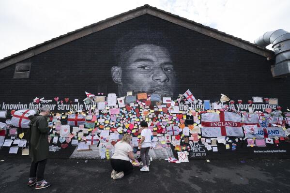 Defaced UK soccer star mural transformed into symbol of anti-racism