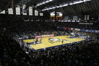FILE - Hinkle Fieldhouse is shown in the second half of an NCAA college basketball game between Butler and Marquette in Indianapolis, in this Jan. 18, 2014, file photo. Hinkle Fieldhouse is one of six venues hosting NCAA Tournament games later this week. (AP Photo/Michael Conroy, File)