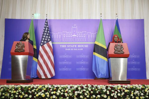 U.S Vice President Kamala Harris, left, and Tanzanian President Samia Suluhu Hassan speak during a news conference following their meeting in Dar es Salaam, Tanzania, Thursday, March 30, 2023. (Ericky Boniphace/Pool Photo via AP)