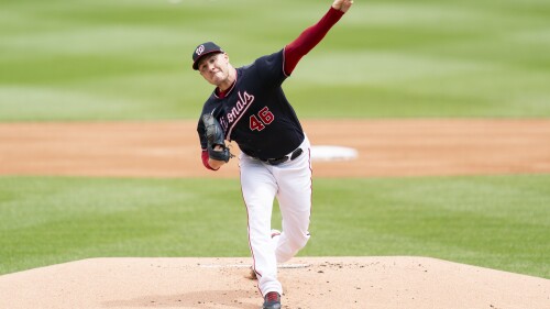Washington Nationals starting pitcher Patrick Corbin delivers during the first inning of a baseball game against the Texas Rangers, Sunday, July 9, 2023, in Washington. (AP Photo/Stephanie Scarbrough)