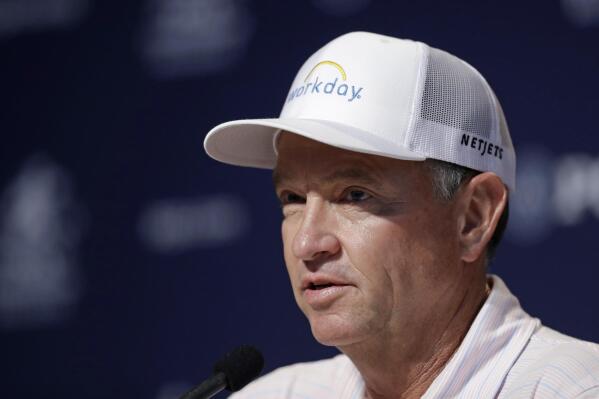 FILE - Davis Love III responds to a question during a news conference for the PGA Championship golf tournament at Bellerive Country Club in St. Louis, Aug. 7, 2018. Davis Love III is captain of the President Cup American team. The tournament begins Thursday, Sept. 22, 2022. (AP Photo/Darron Cummings, File)