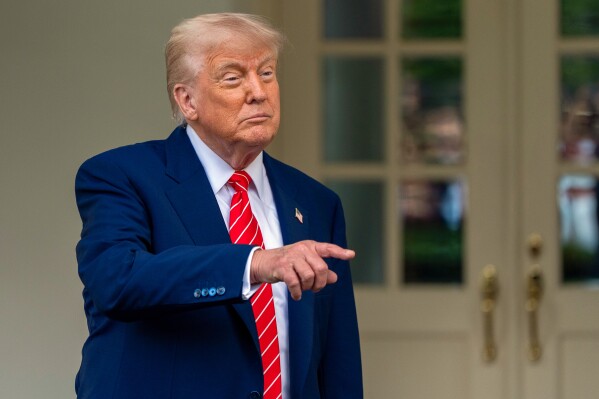 President Donald Trump speaks to reporters in front of the west wing of the White House on Thursday, May 8, 2025, in Washington. (AP Photo/Alex Brandon)