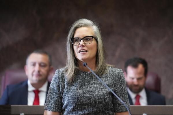 FILE - Arizona Gov. Katie Hobbs delivers her State of the State address at the Arizona Capitol in Phoenix, Jan. 9, 2023. On Friday, March 3, 2023, Hobbs said corrections officials do not plan to carry out an execution on April 6, 2023, even though the state Supreme Court scheduled it over the objections of the state's new attorney general. Hobbs has ordered a review of death penalty procedures in Arizona due to the state's history of mismanaging executions. (AP Photo/Ross D. Franklin, File)