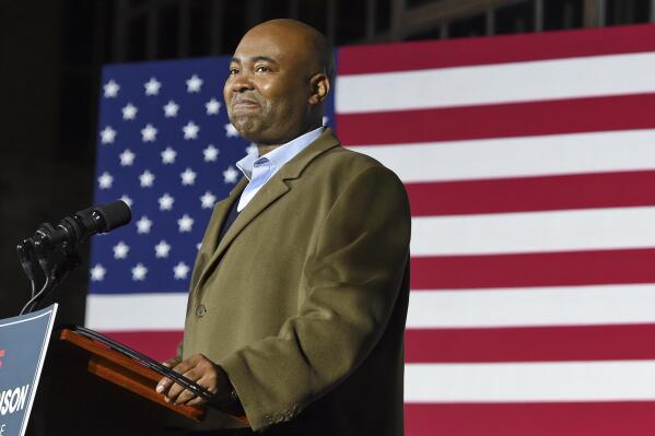 FILE - Democratic Senate candidate Jaime Harrison speaks at a watch party in Columbia, S.C., after losing the Senate race Nov. 3, 2020. Harrison was Biden's pick for DNC chair, in part, because of the extraordinary fundraising success he had in his underdog campaign against South Carolina Republican Sen. Lindsey Graham last year. Harrison's campaign raised an eye-popping $109 million, although he lost the election by 10 points.  (AP Photo/Richard Shiro, File)