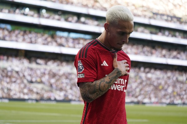 Manchester United's Antony reacts during the Premier League soccer match between Tottenham Hotspur and Manchester United at the Tottenham Hotspur Stadium in London, England, Saturday, Aug. 19, 2023. (AP Photo/Alberto Pezzali)